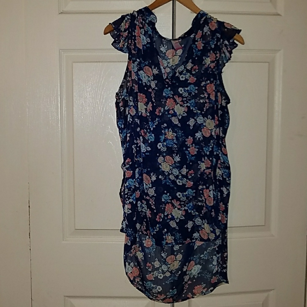 navy blue polyester blouse with flower prints.